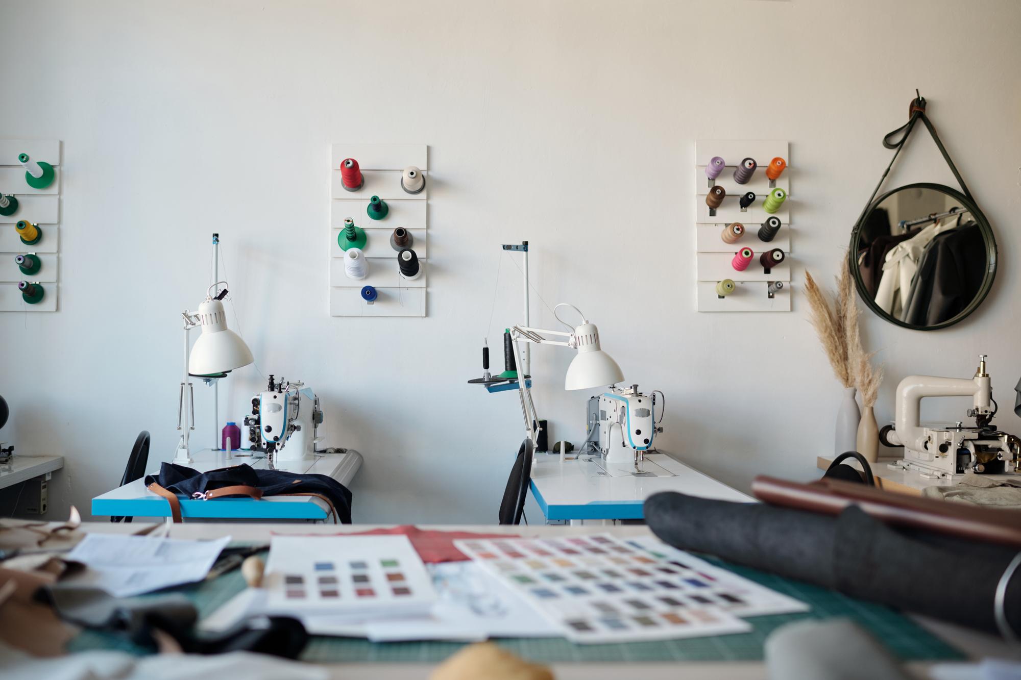 studio interior with embroidery machines and hoops