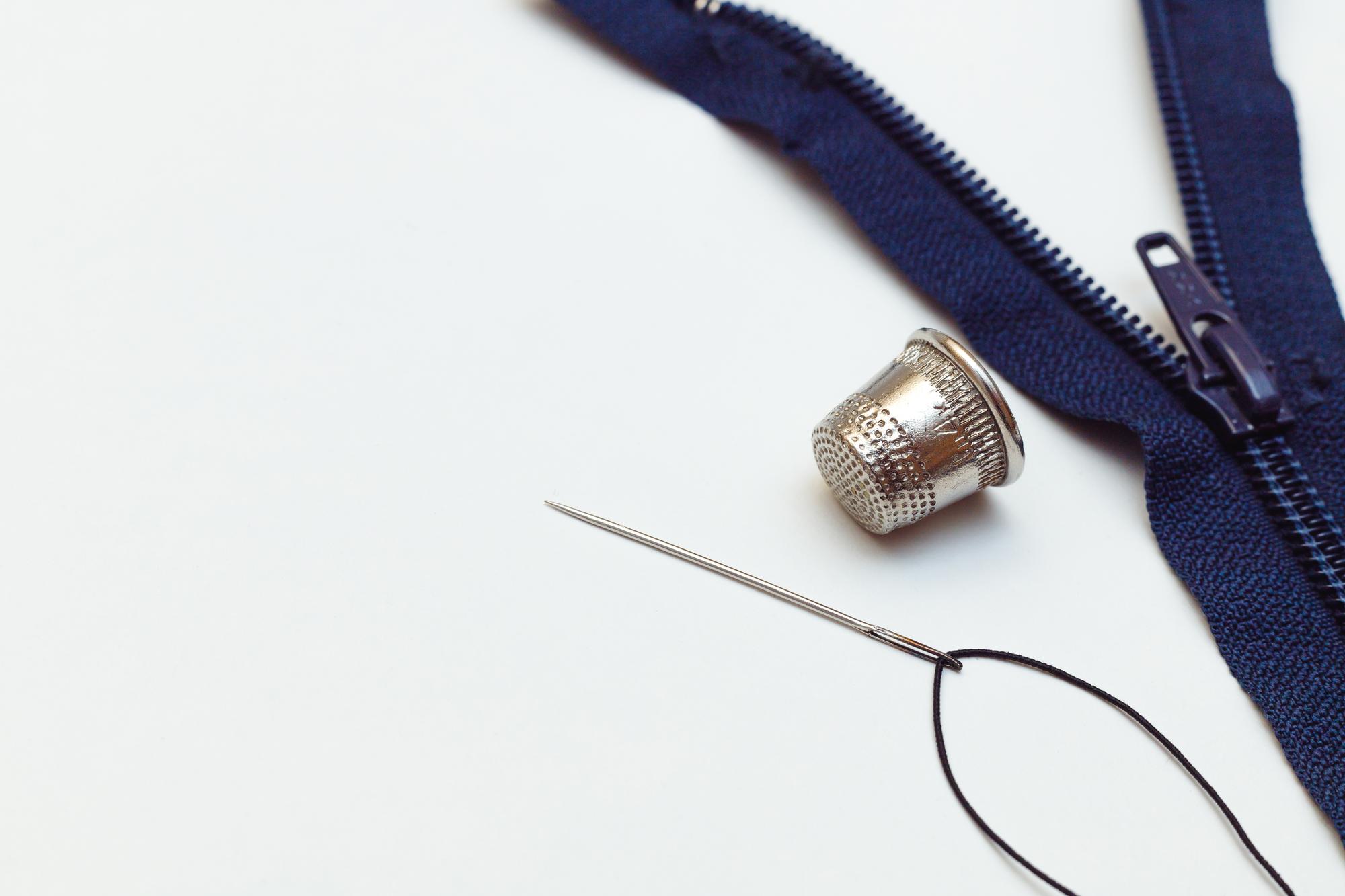 embroidered jacket cuff with metallic thread